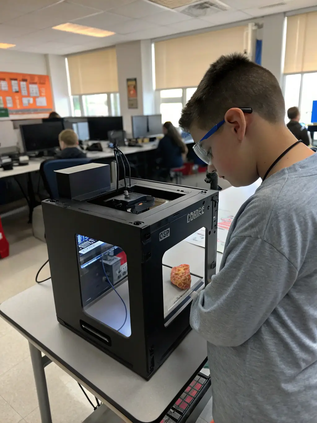 A student using a 3D printer to create a prototype, with the Arazaka Corp logo subtly displayed on the printer.